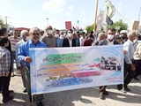 حضور کارکنان حوزه سلامت کازرون در آیین راهپیمایی یوم الله 13 آبان