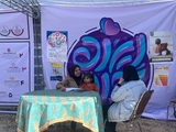 حضور مسوول و کارشناسان واحد سلامت خانواده مرکز بهداشت شهید پیرویان کازرون در غرفه مشاوره فرزندآوری جشنواره گل نرگس